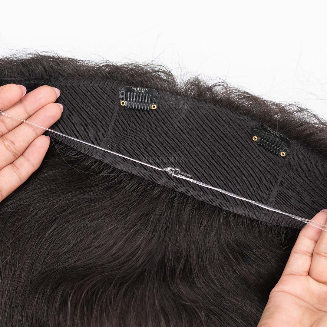 close-up of the back view, showing the hair band being stretched in both hands to highlight its flexibility