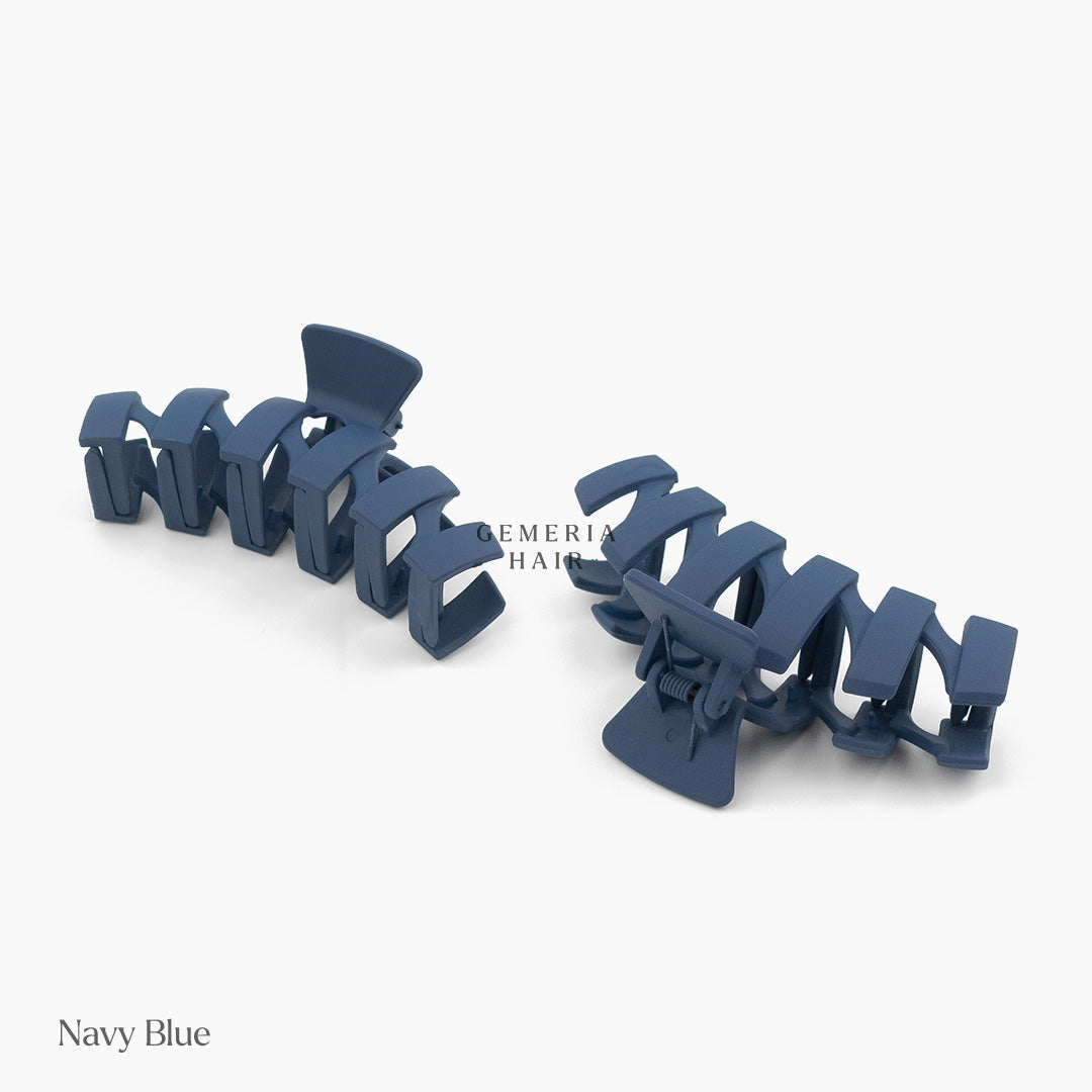 2 large navy blue zig-zag hair claw clips