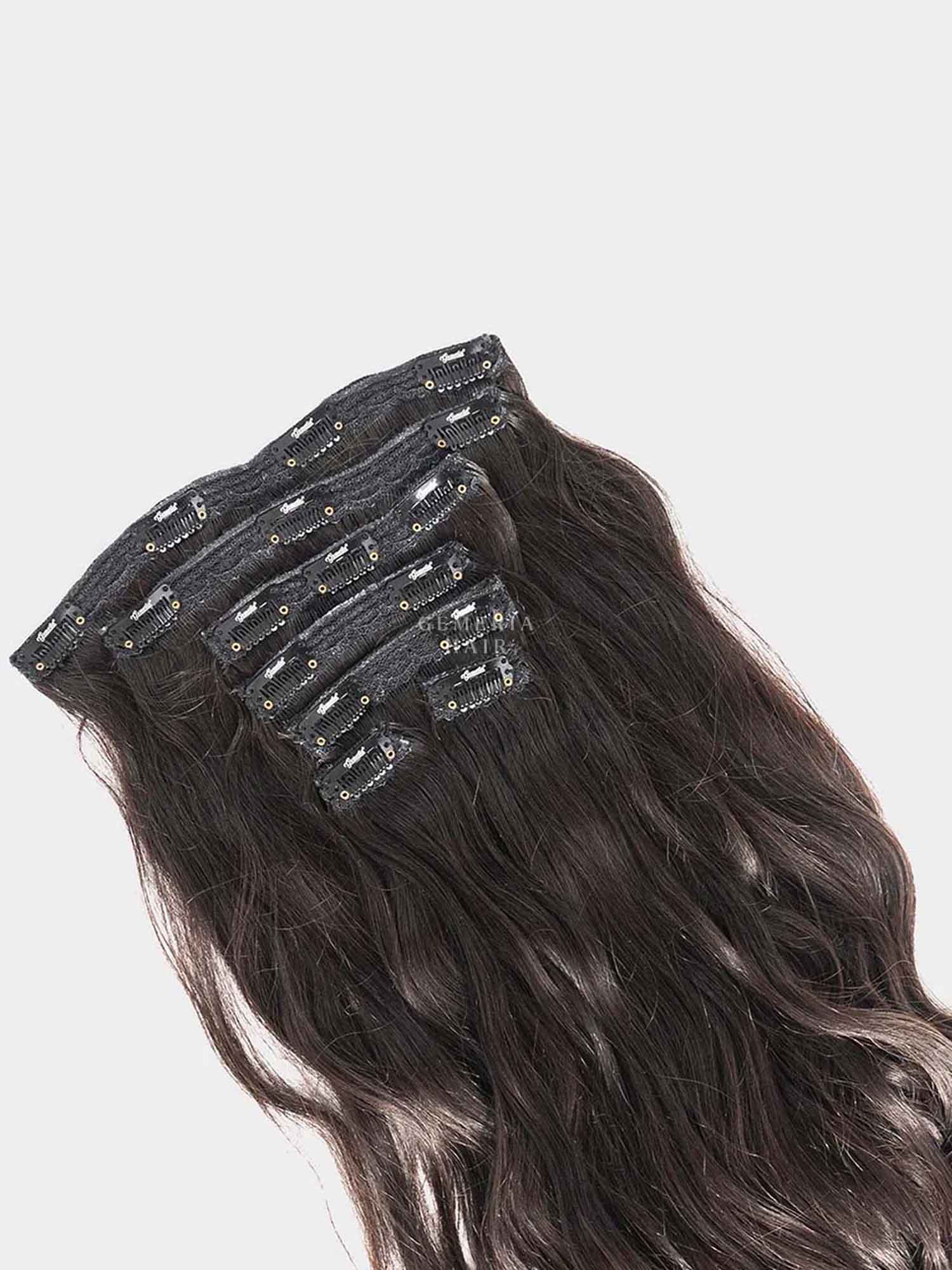 Close-up of clips on wavy hair extensions