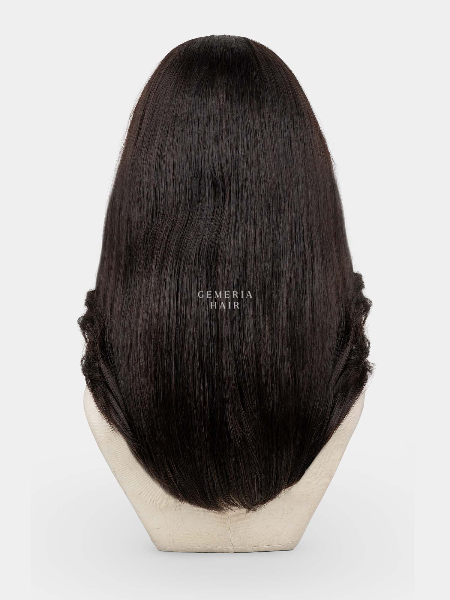 Back view of Dakota full head wig showing layered length and volume