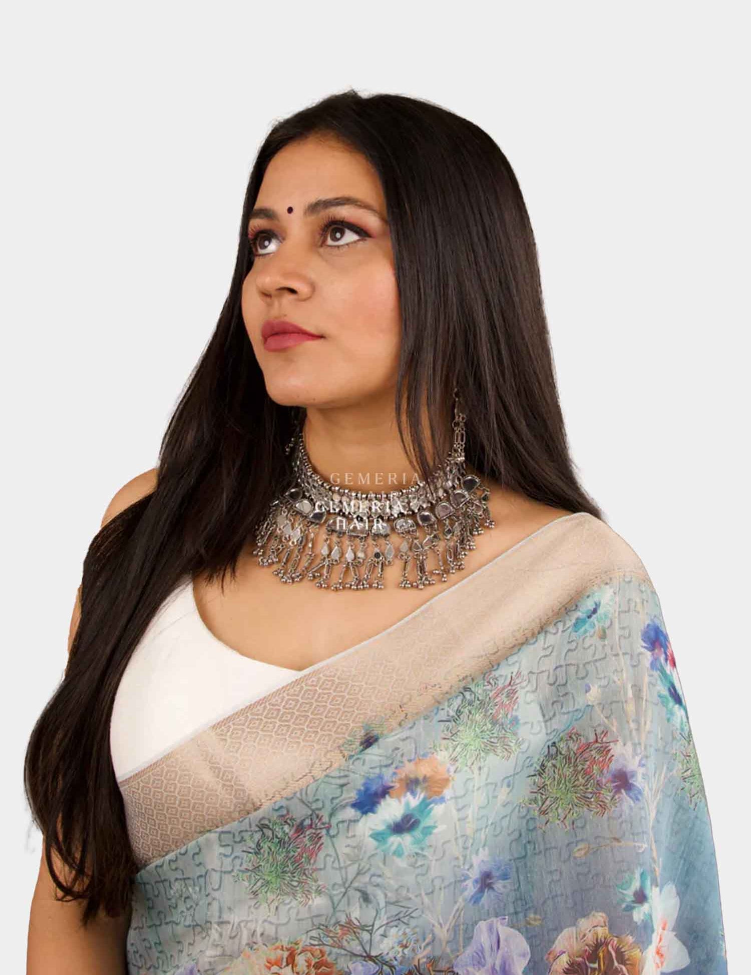 Woman wearing natural straight clip-in hair extensions