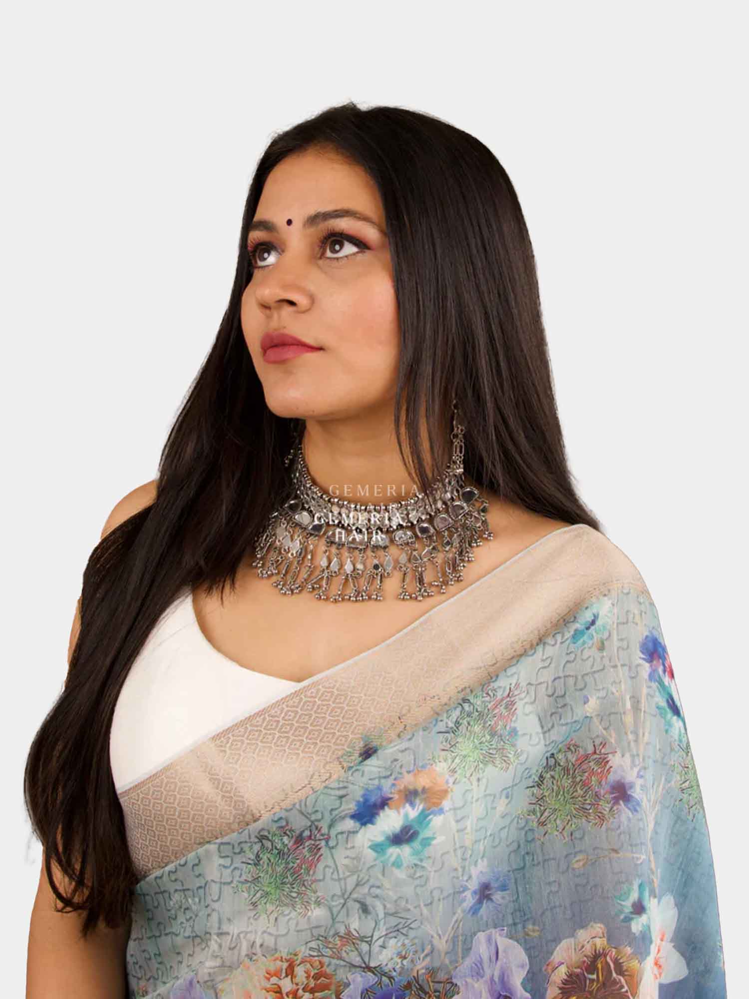 Woman wearing natural straight clip-in hair extensions