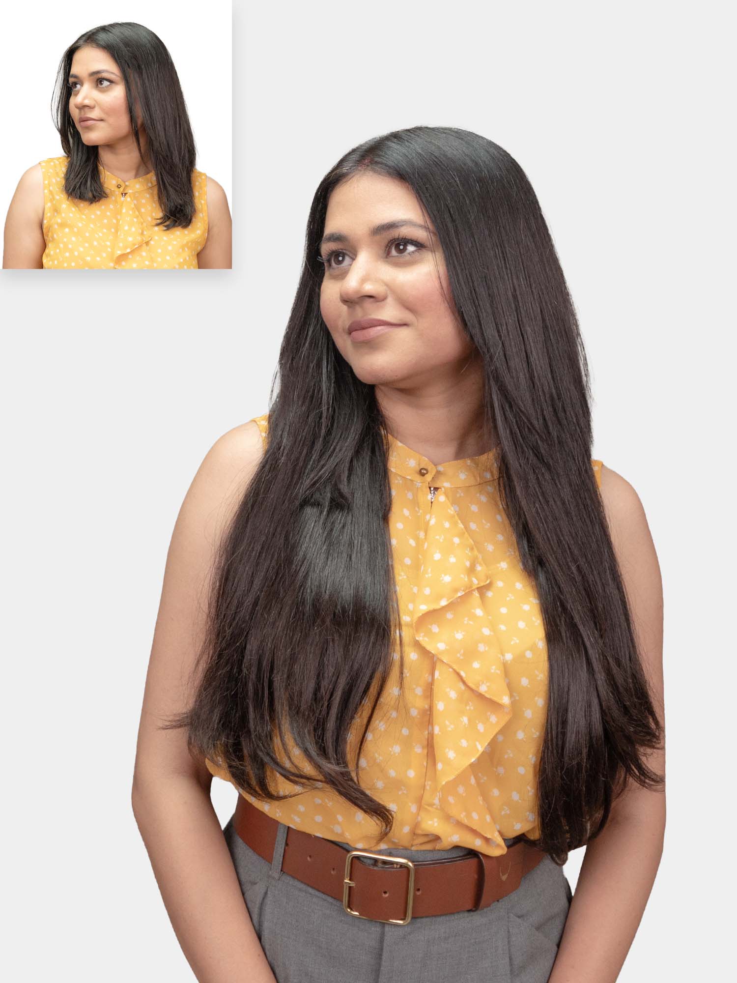 A woman with long straight hair wearing a yellow top, showcasing seamless clip-in hair extensions.