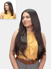 A woman with long straight hair wearing a yellow top, showcasing seamless clip-in hair extensions.