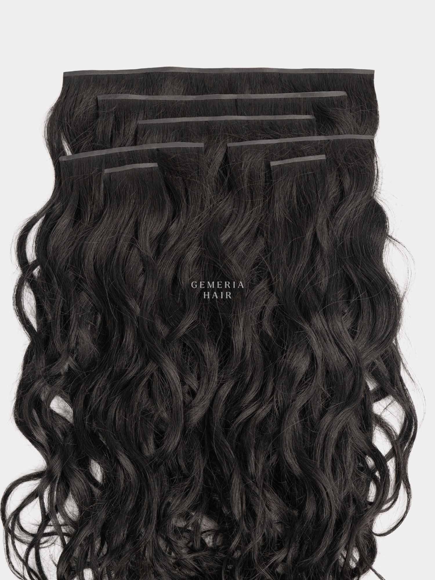 Set of black hair extensions with front  view