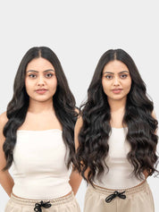 Women wearing wavy clip-in hair extensions